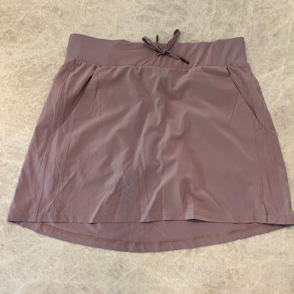 Women’s mauve tennis skirt—never worn